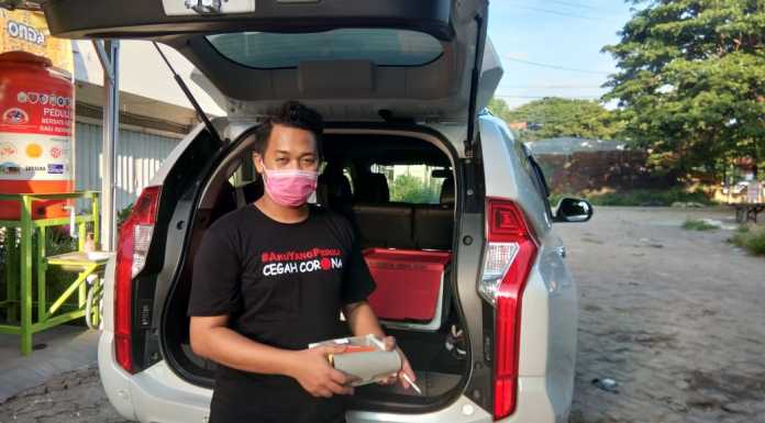 Relawan Yayasan Gerak Bersama Indoneaia Penyemprotan Disenfektan